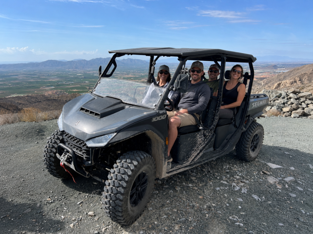Guests enjoying a Segway U10 off-road buggy tour with panoramic mountain views near Finca Moñino, Alicante and Murcia.