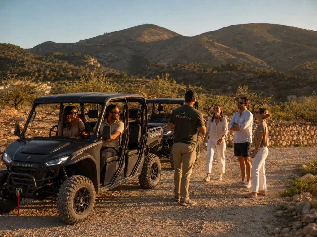Adult guests with two Segway U10 Crew vehicles during a guided countryside activity near Finca Moñino